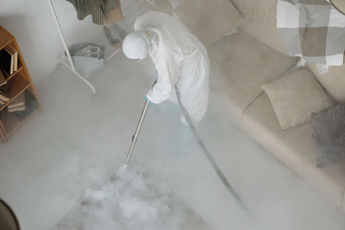 Biohazard cleanup technician in protective equipment, Tuxedo, NY